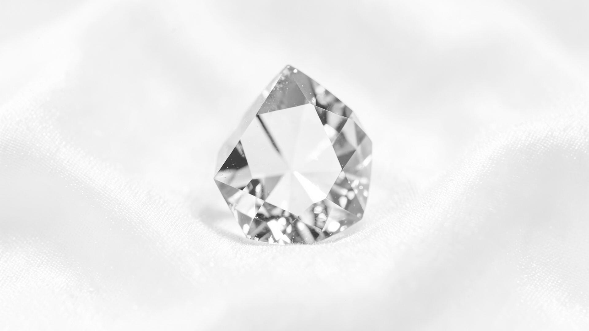 Macro view of a faceted Austrian crystal in platinum and obsidian tones